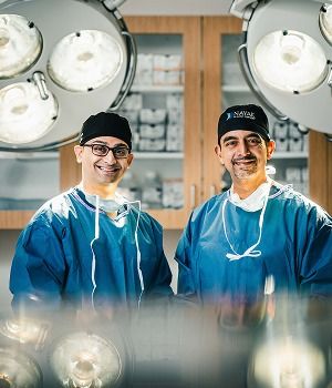 St. Louis facial plastic surgeon Dr. Nayak and  Dr. Kachare posing together.