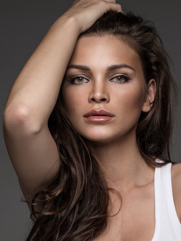 Portrait of a woman with long hair.